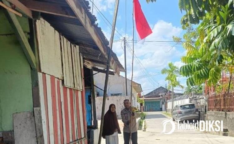 Ekspedisi Merah Putih Polsek Bukitraya: Bhabinkamtibmas Bagikan Bendera, Polisi Dekat dengan Rakyat