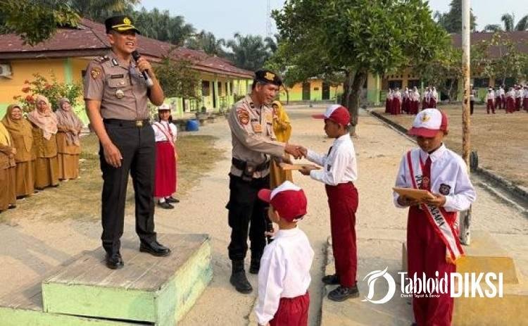 Tanam Pohon Bersama Siswa, Polsek Tapung Gencarkan Green Policing dari Sekolah