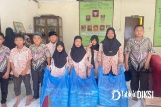 Suasana Kabut Asap, Karyawan Grand Dragon dan New Paragon Tetap Berbagi di Medan