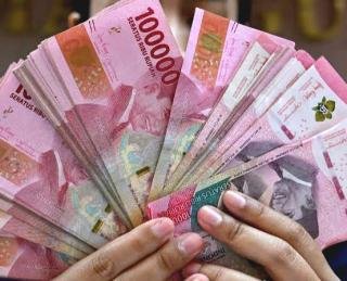 The Fed Tahan Suku Bunga, Rupiah Menguat ke Rp18.129 per Dolar AS